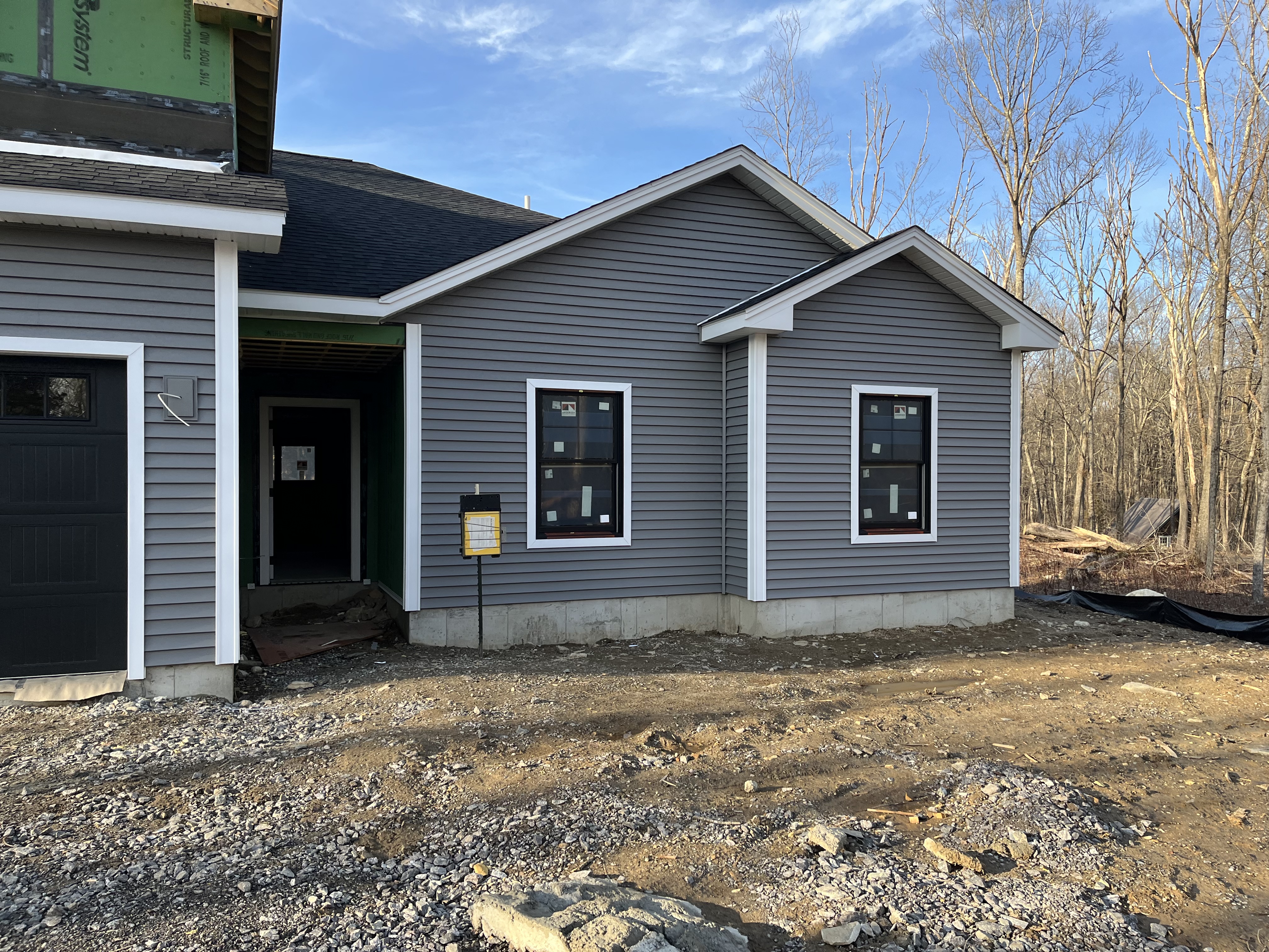 Siding in Process / New Windows