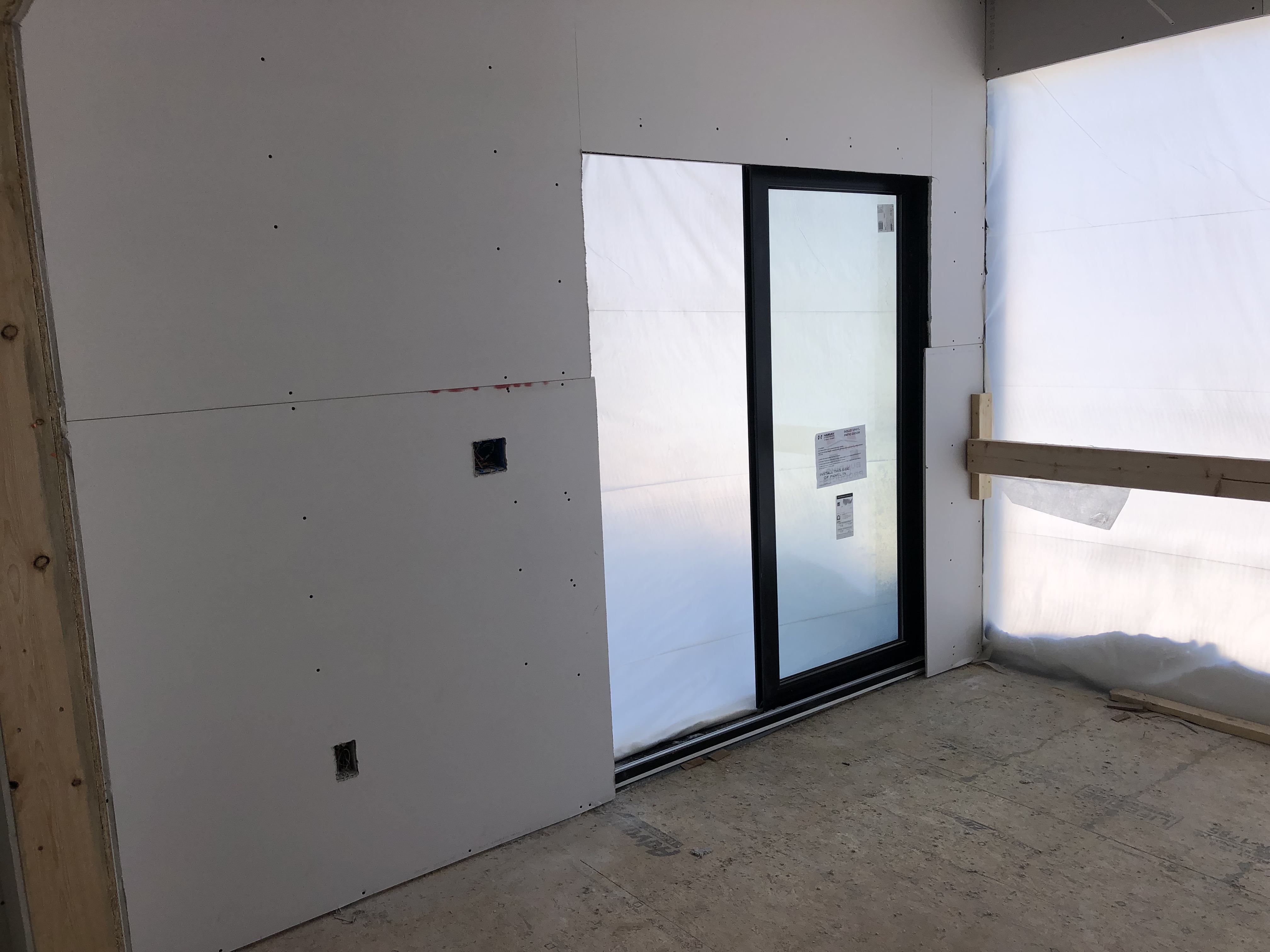 Sheet Rock and New Sliding Door