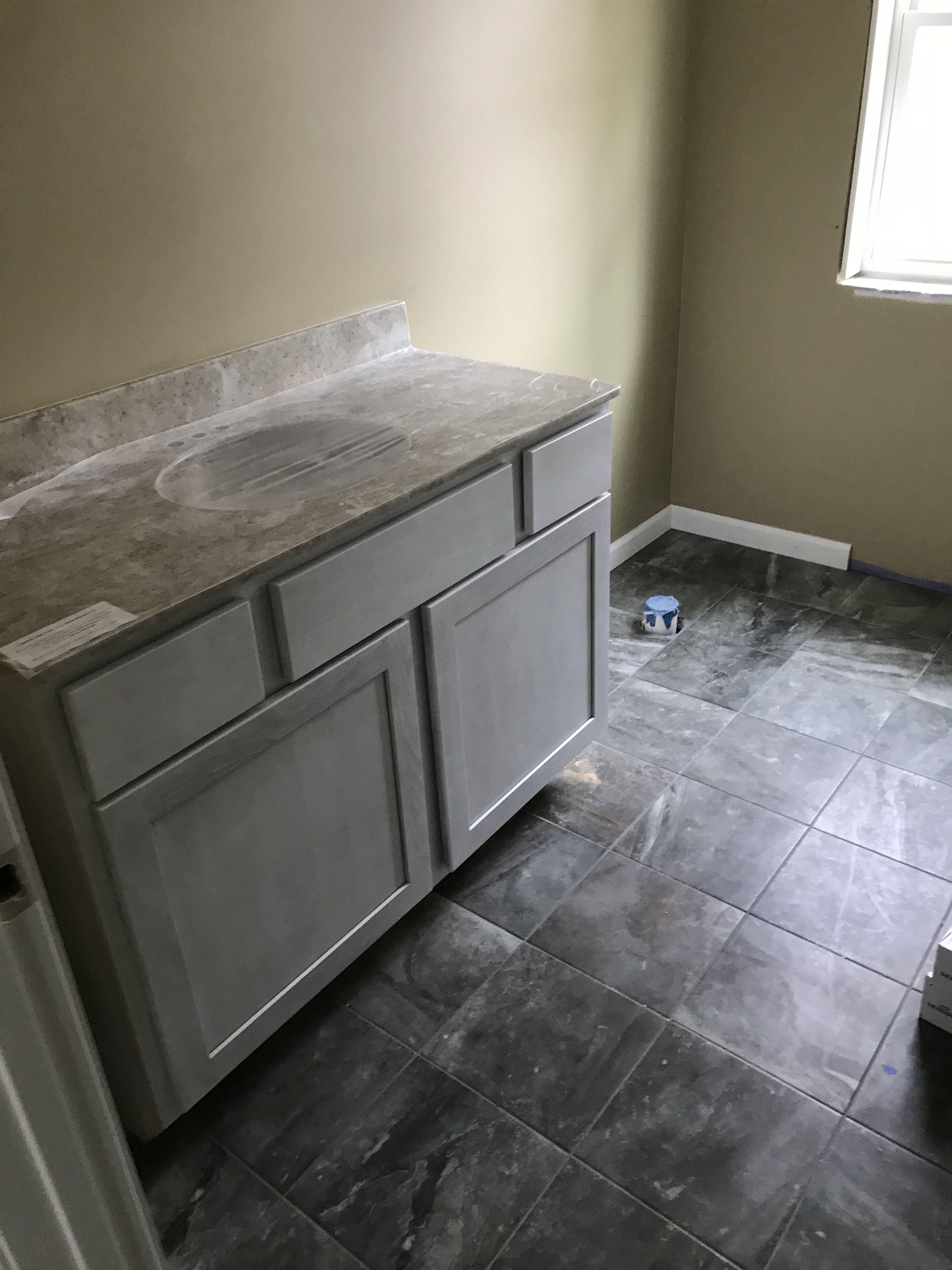 New Bathroom Vanity & Tile Flooring