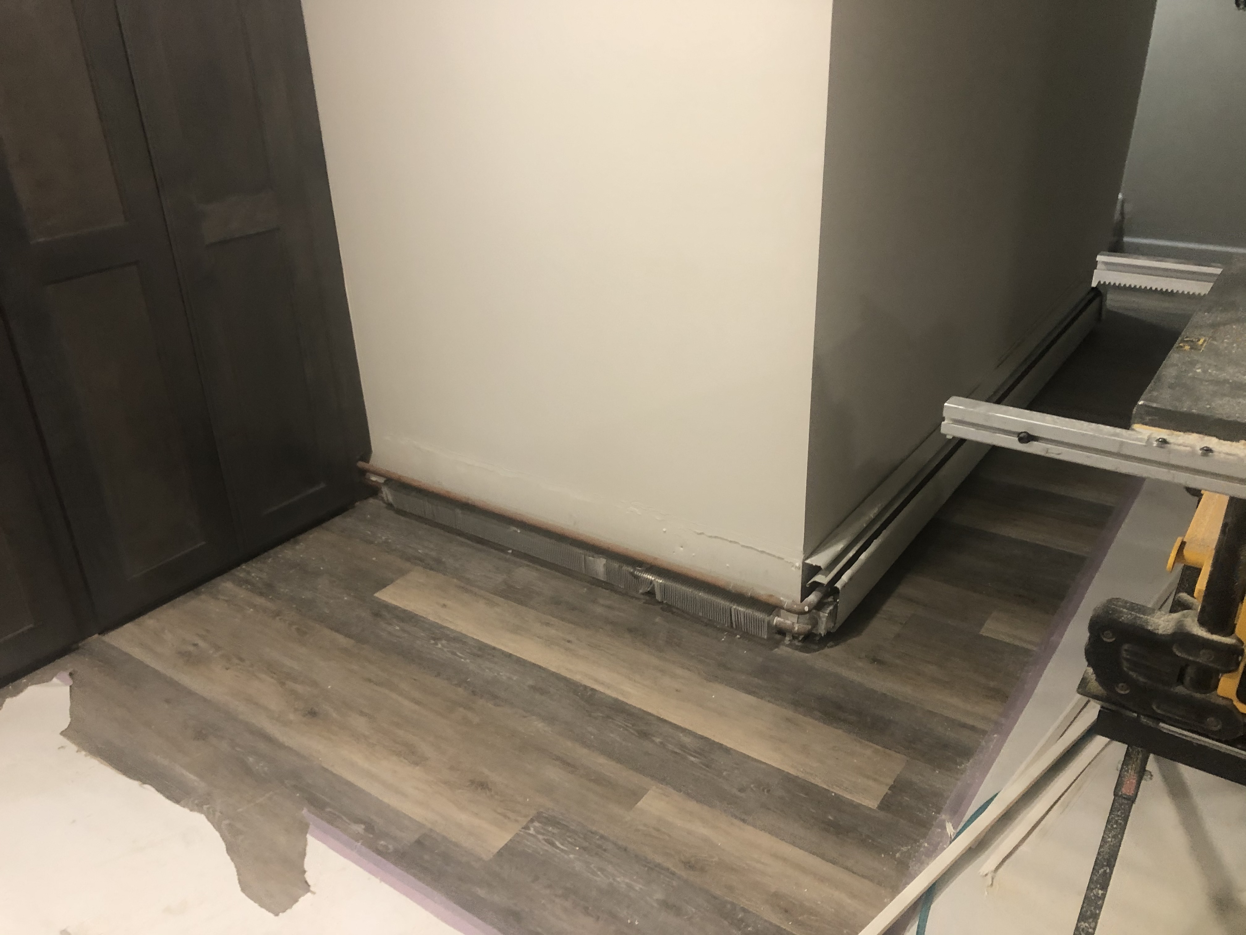Removal of Baseboard, New Flooring