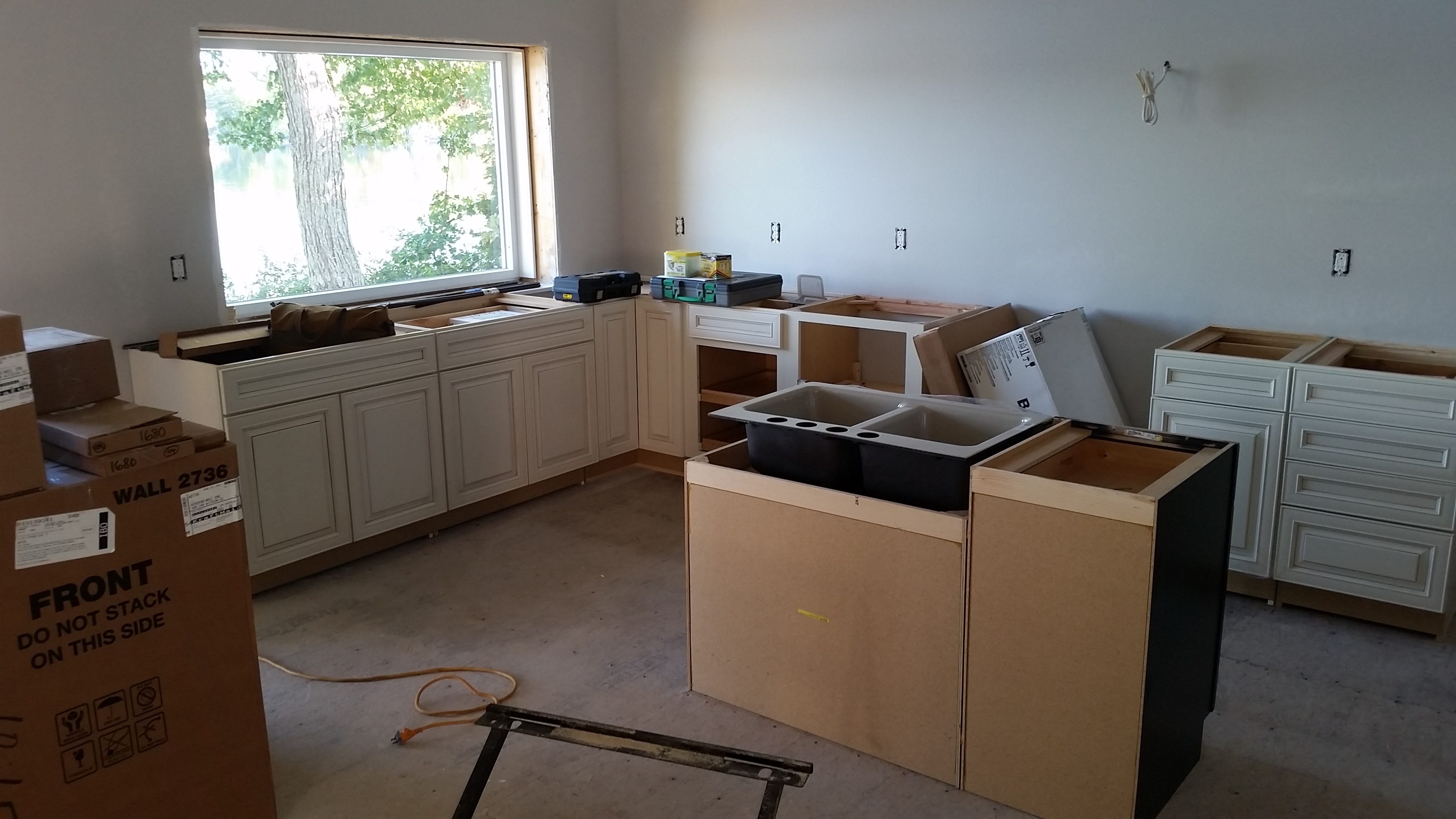Kitchen Cabinets begin to take shape