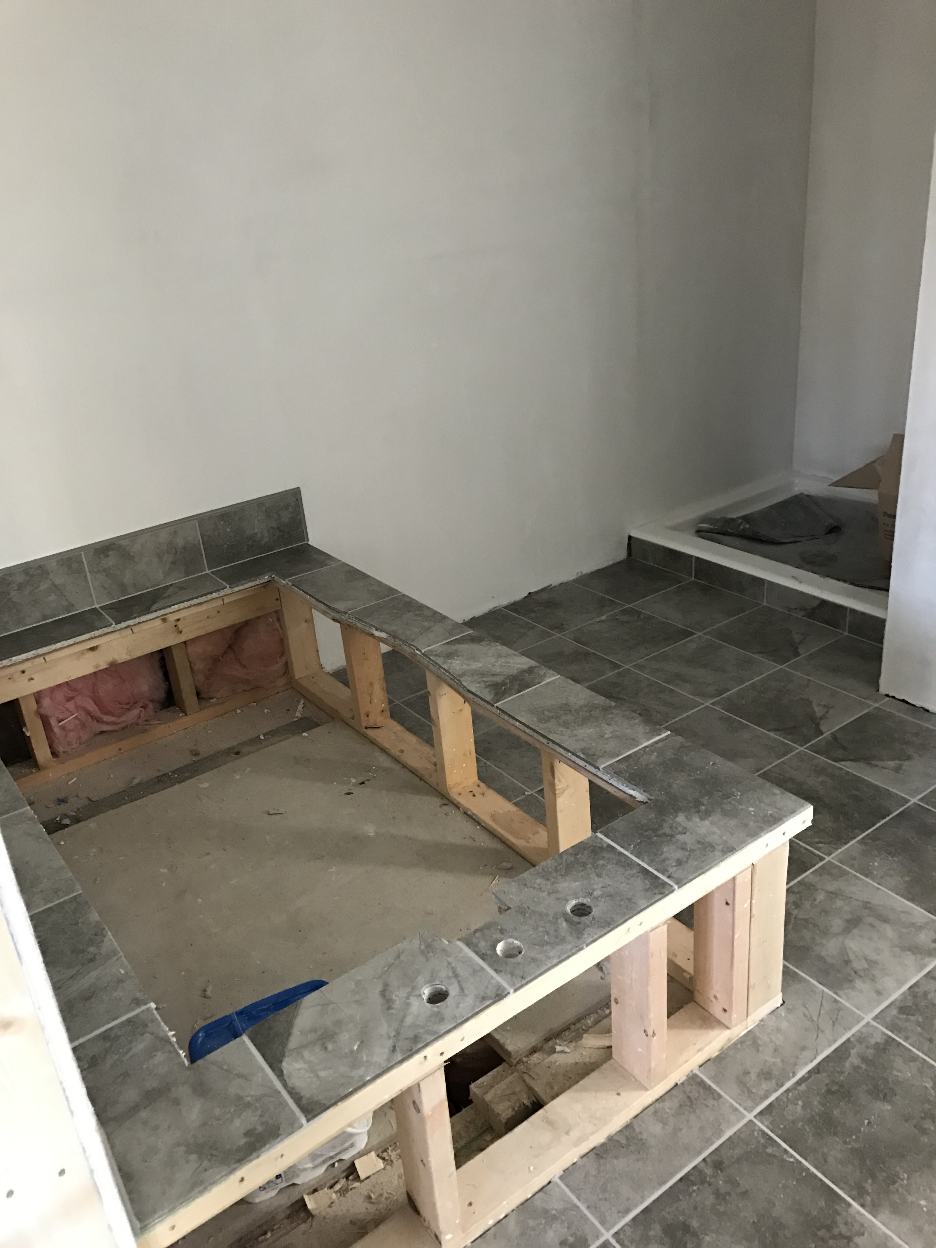 Sheetrock up and tile installed