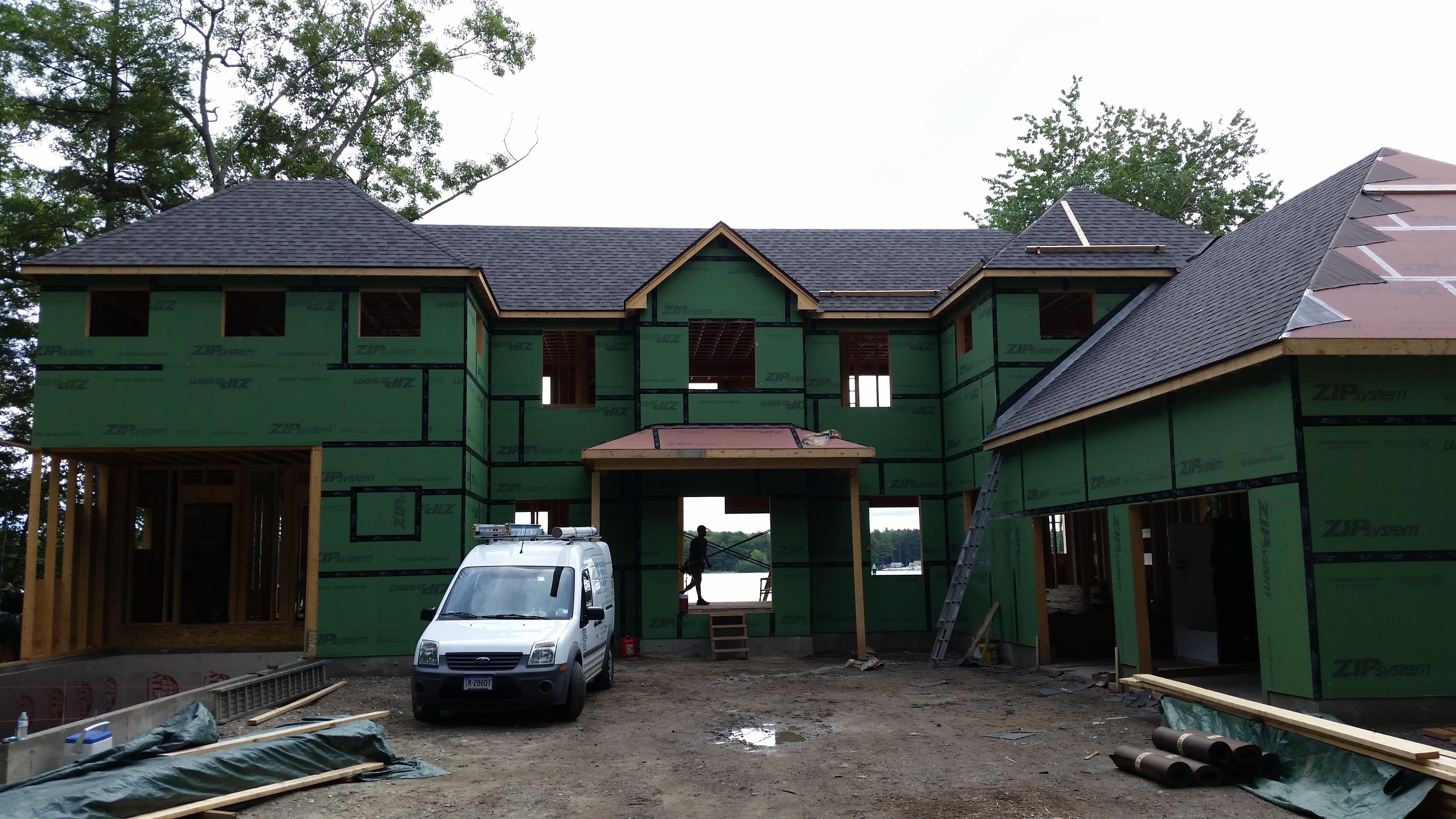 Framing continues - roof starts installation