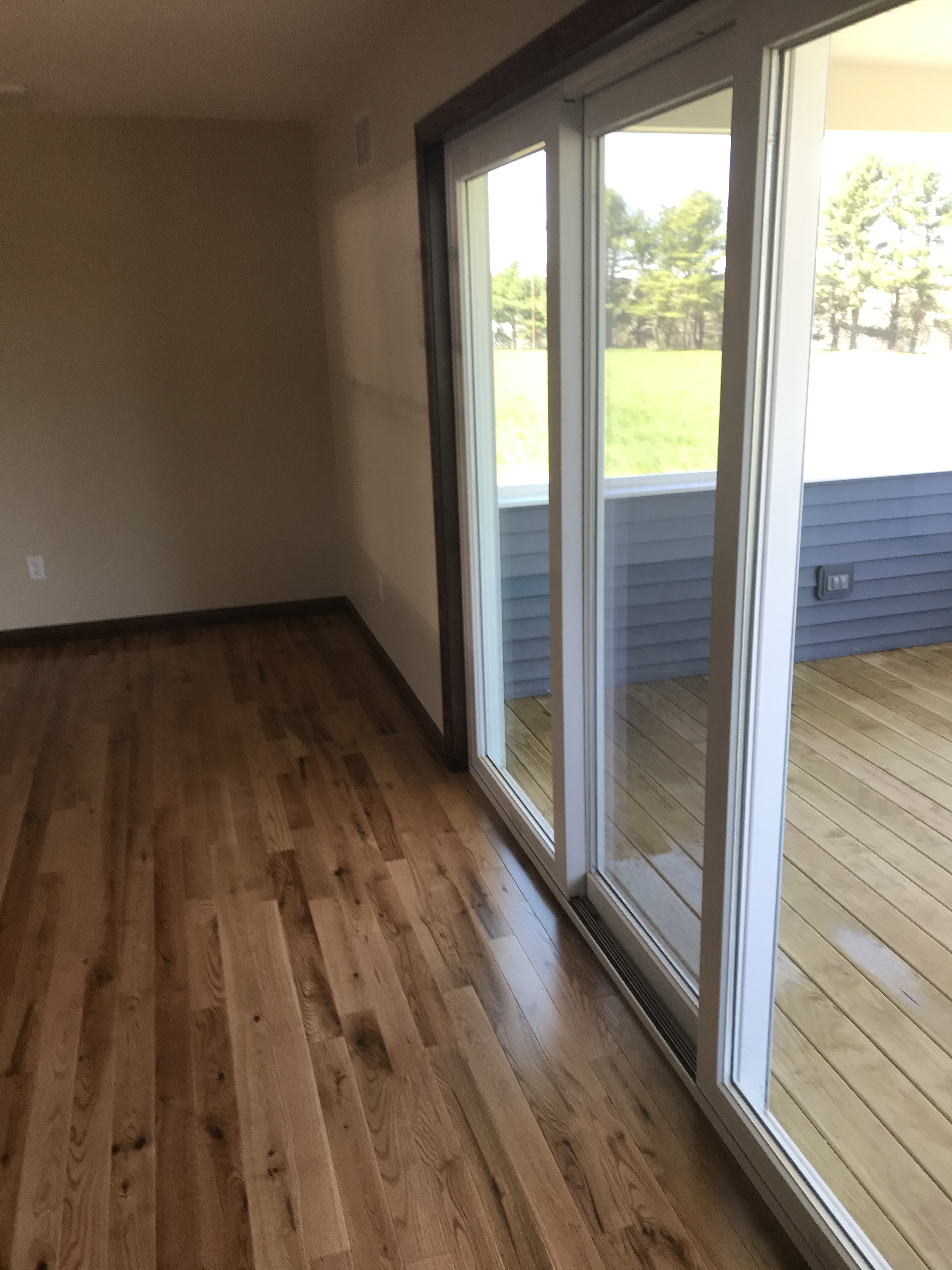Wood Floor and New Sliding Glass Door